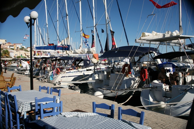 Mandrakia - Flotillas fill the Southern waterfront in Summer